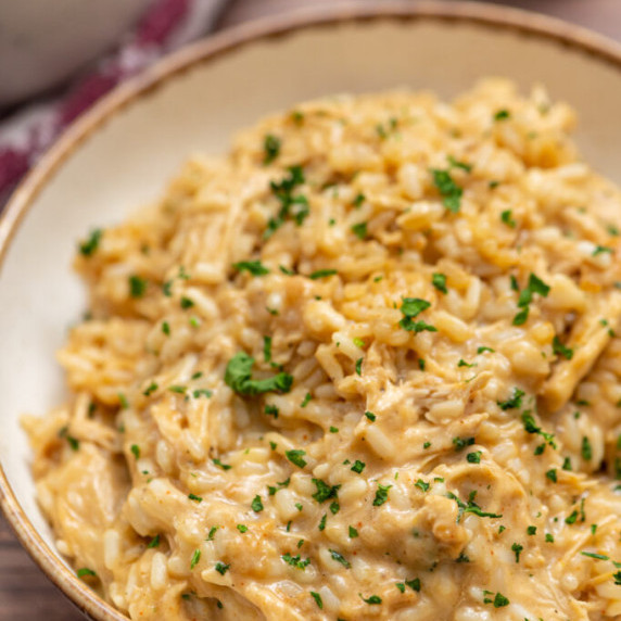 a bowl of chicken and rice casserole served.