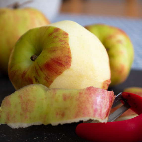 a partially-peeled apple
