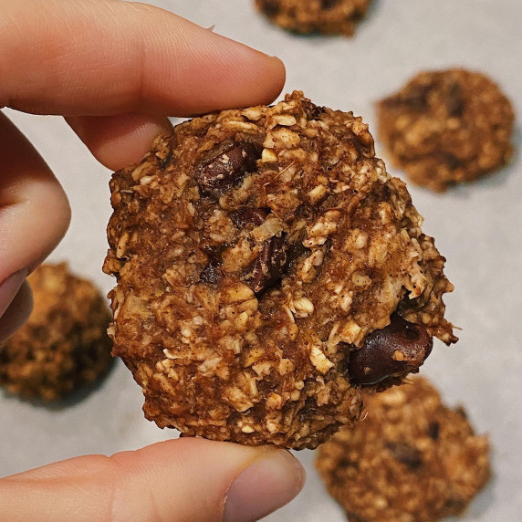 Hand holding a cookie close up