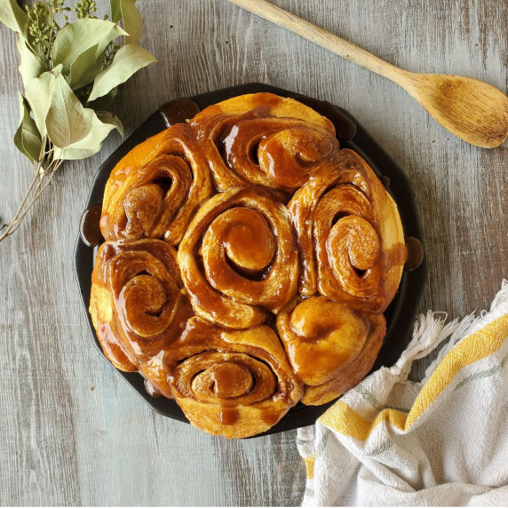 Amish sticky buns on a round plate.
