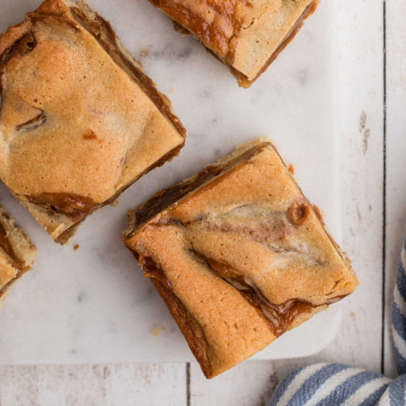 Close up overhead view of some caramel swirl blondies.