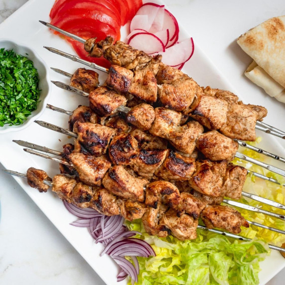 Platter of chicken shawarma kebabs.