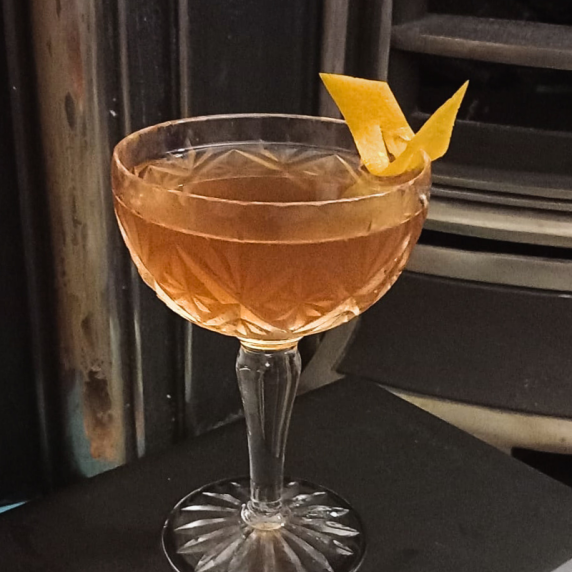 El Presidente cocktail served in a cocktail glass