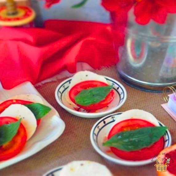 Easy Caprese Salad with mozzarella, red tomatoes, and basil leaves and blood orange vinaigrette