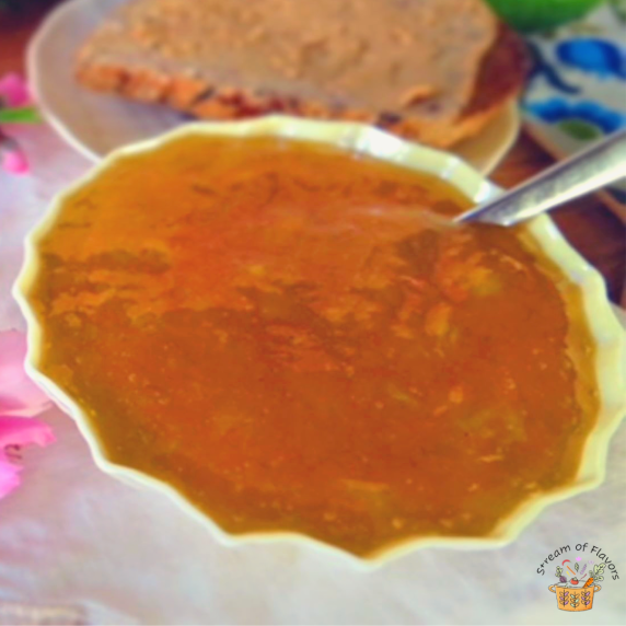 Easy Mango Jam Recipe without pectin and mango, sugar, lime juice, and lime zest in a white bowl