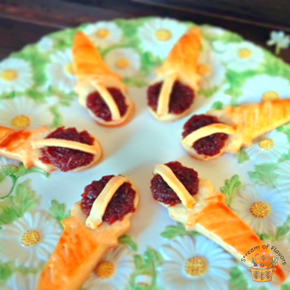 Pineapple tarts on a green floral plate