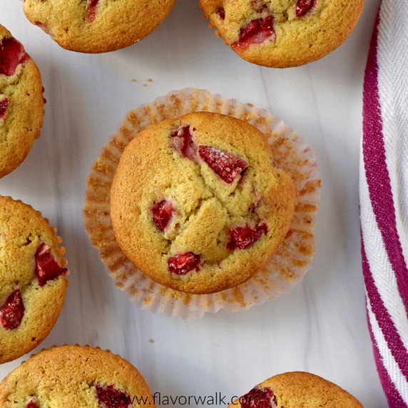 Overhead view of gluten free strawberry muffins on kitchen counter.