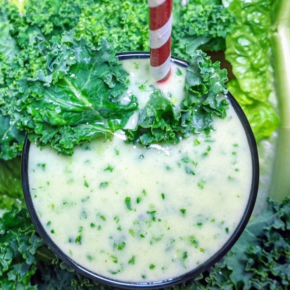 green smoothie with avocado, kale, kiwi and lettuce