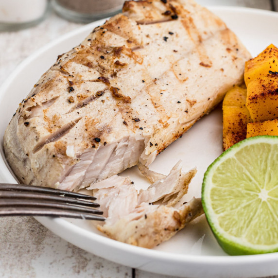 Close up of a piece of grilled cobia.