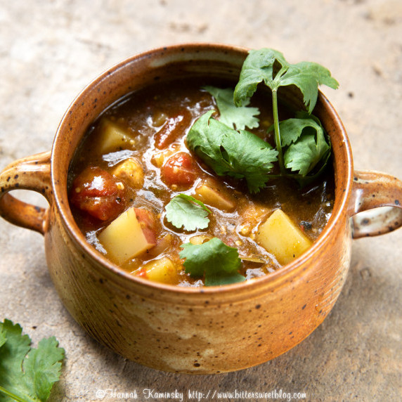 A bowl of meatless hatch green chilie stew garnished with cilantro.