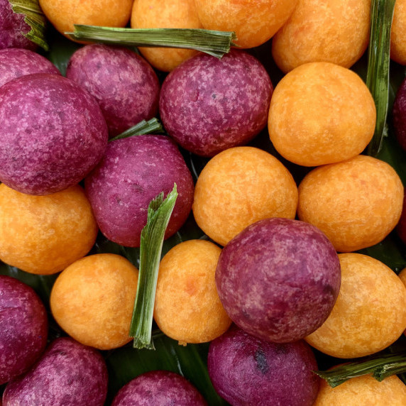 Close-up of purple and orange sweet potato balls