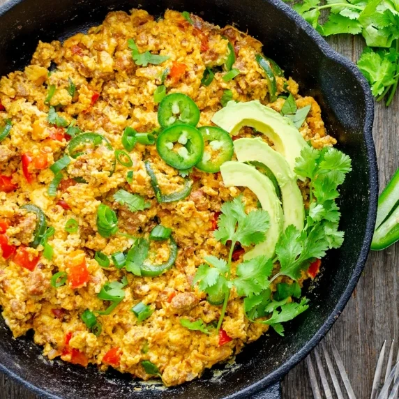 Spicy Tex Mex scrambled eggs in a cast iron skillet 