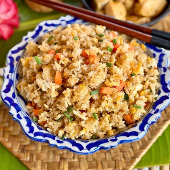 Side dish fried rice with vegetables served in a patterned bowl.