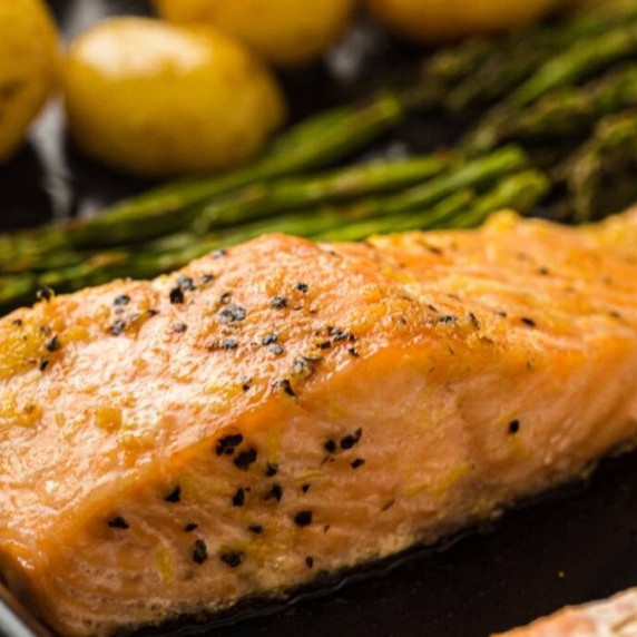 Sheet pan with roasted salmon, asparagus, and potatoes.