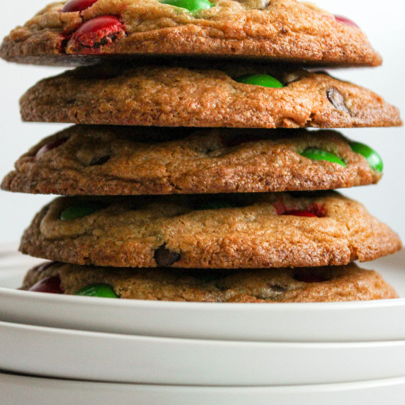 M&M Christmas Cookies stacked on white plate