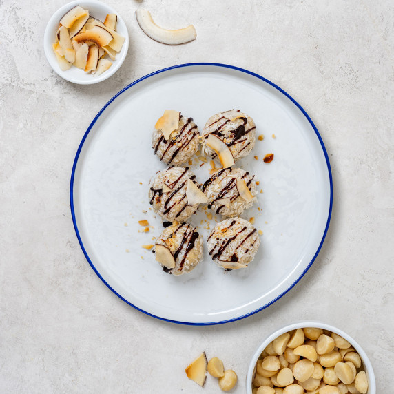 Macadamia bon bons arranged on a white plate