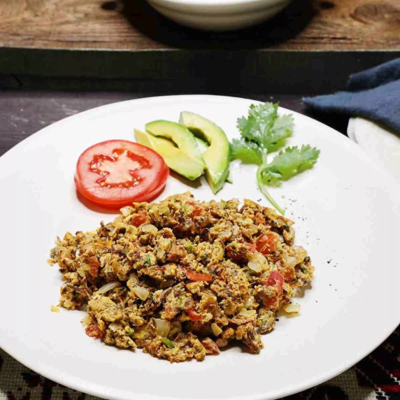 Machaca con Huevo on white plate.