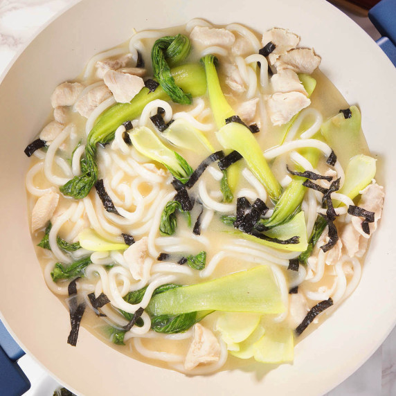 miso chicken noodle soup in a pan