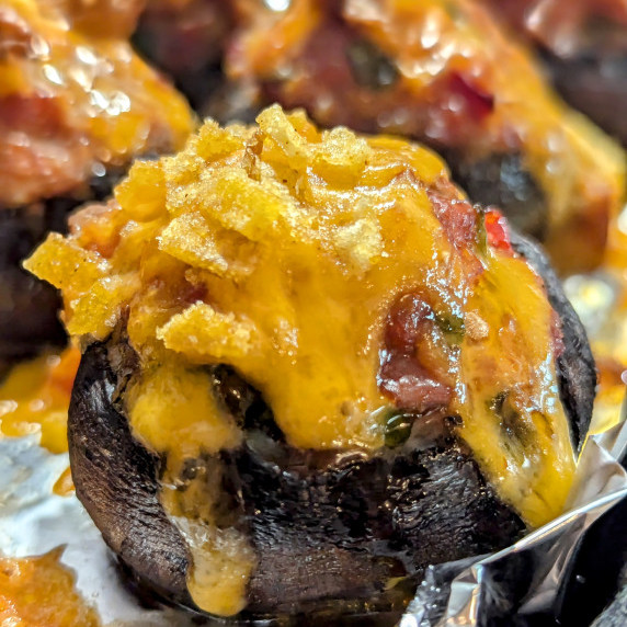 A smoked sausage stuffed mushroom.