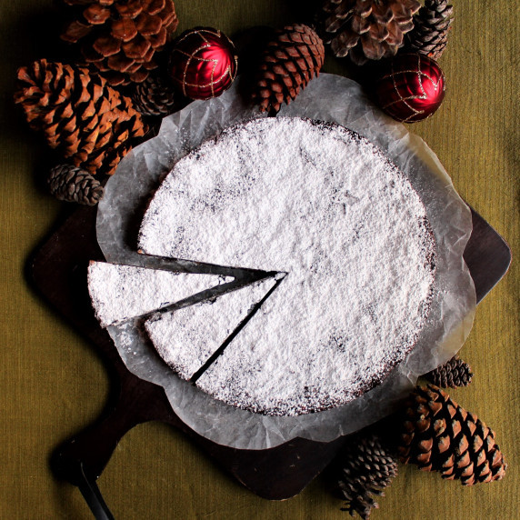 A panforte with two slices cut out
