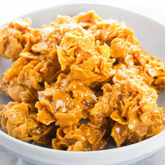 peanut butter cornflake cookies in a white bowl