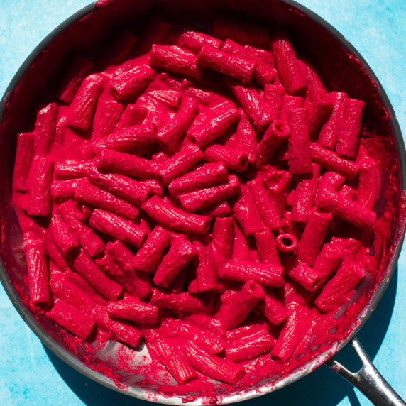Overhead shot of pink pasta in pan