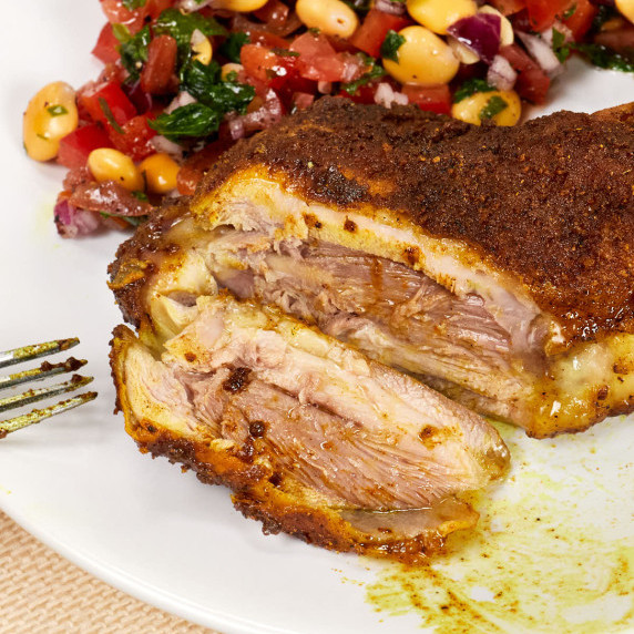 Sliced roasted chicken leg