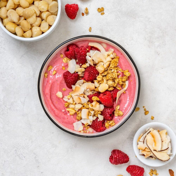 Raspberry macadamia smoothie bowl with fruit
