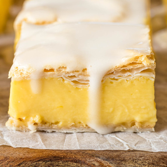 Vanilla custard slice with icing glaze.