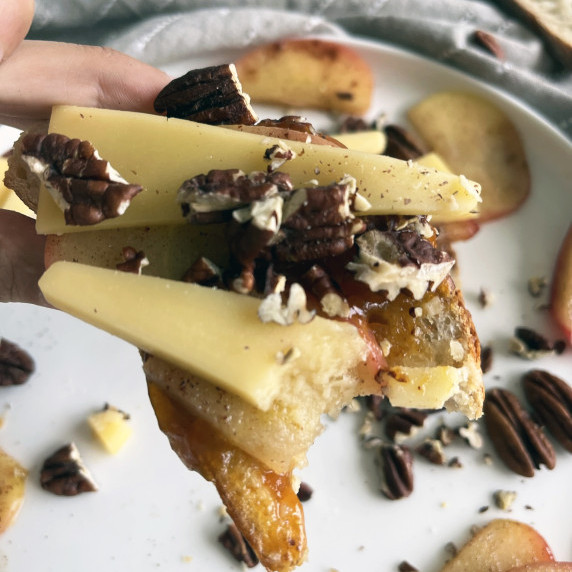 pumpkin butter toast topped with gouda cheese and pecans