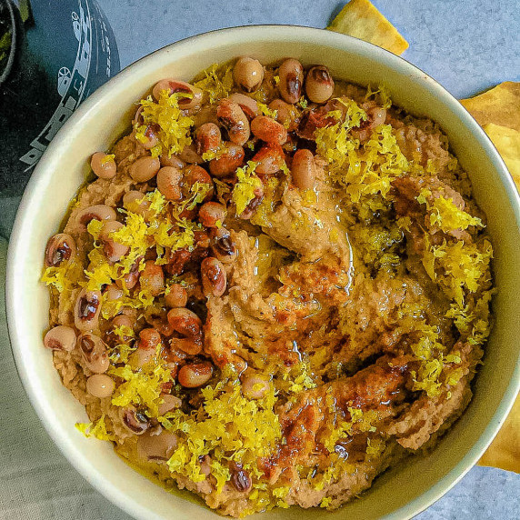 a bowl of black eyed pea hummus