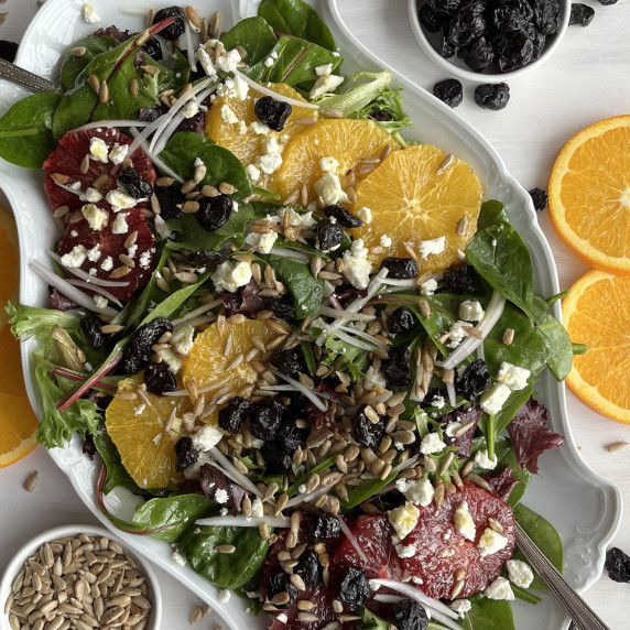 Tossed salad of spring mix, oranges, shallots, feta, dried cherries and sunflower seeds. 