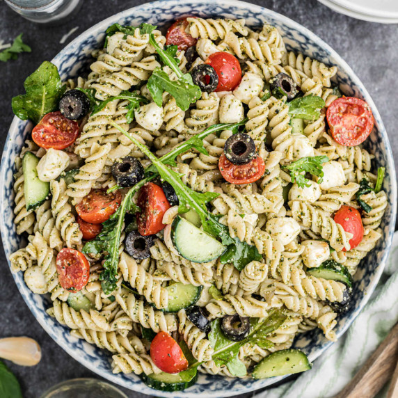 Overhead shot of a bowl of summer pesto pasta salad.