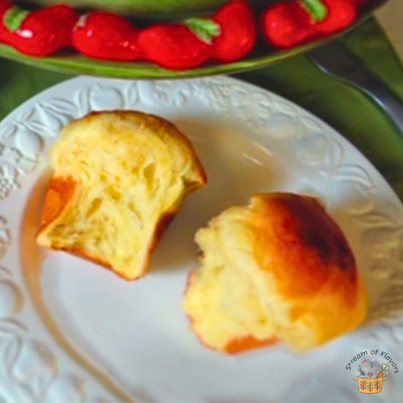 French Brioche Recipe with eggs, butter and milk on a white plate