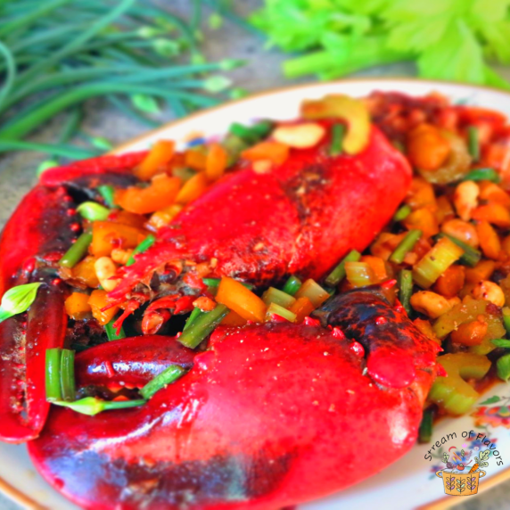 Whole lobster with galangal, chili, celery, and cashews