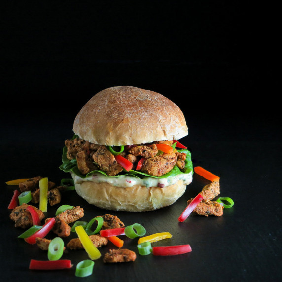 Homemade bread rolls with spicy chicken and garlic mayonnaise