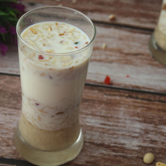 Beaten Rice flakes in delicious banana smoothie