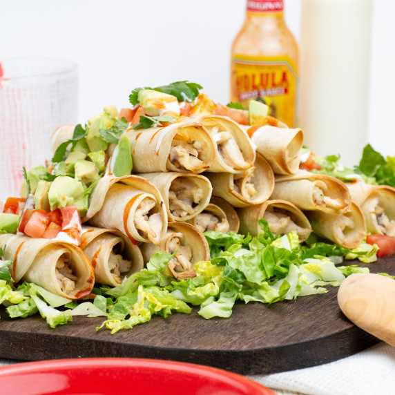 chicken flautas with avocado and tomato
