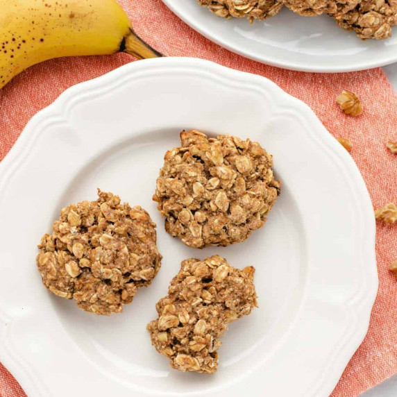 Banana nut oatmeal cookies on a white plate.