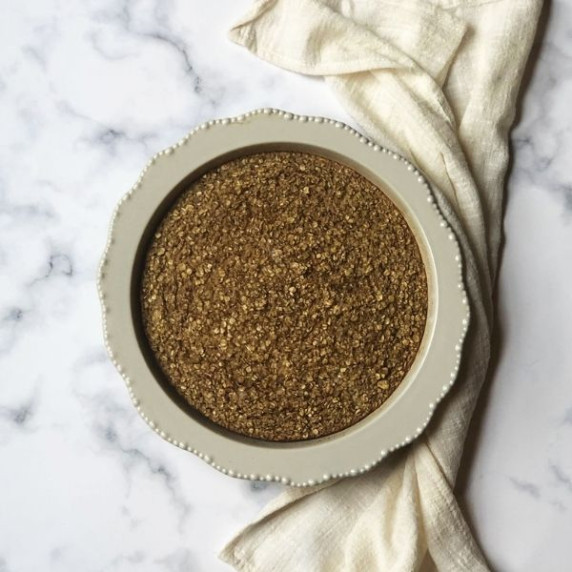 Chia baked oatmeal with a white napkin nearby. 