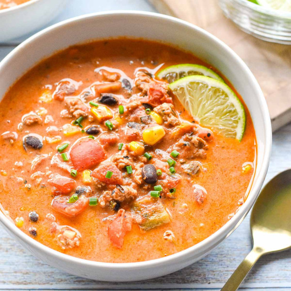 chicken taco soup with black beans and corn in a bowl.