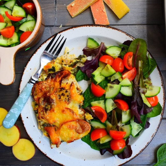 Chicken tartiflette and tomato and green salad