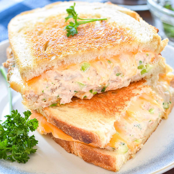 tuna melt halves on a plate.