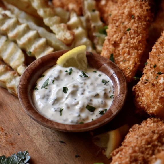 Tartar sauce in a small dish.