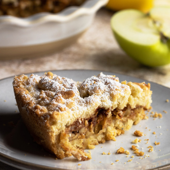 homemade apple pie piece in a plate