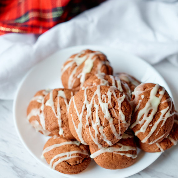 Chocolate eggnog cookies on a white plate. 