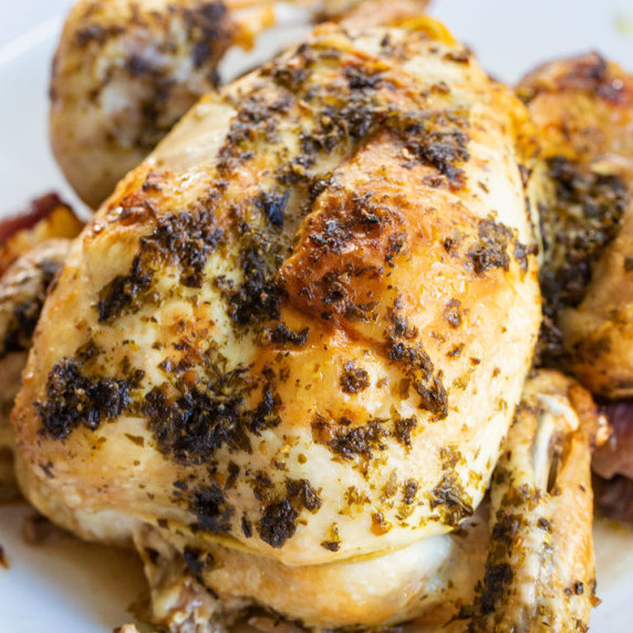 pressure cooked and air fried whole chicken with pesto and lemon
