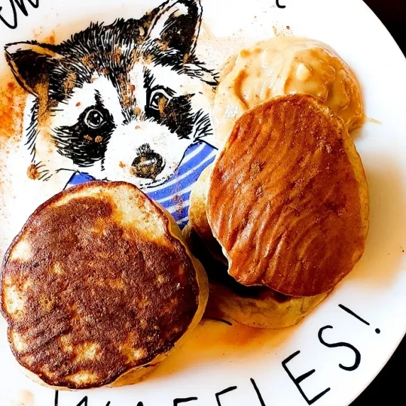stack of protein banana pancakes on racoon waffle plate