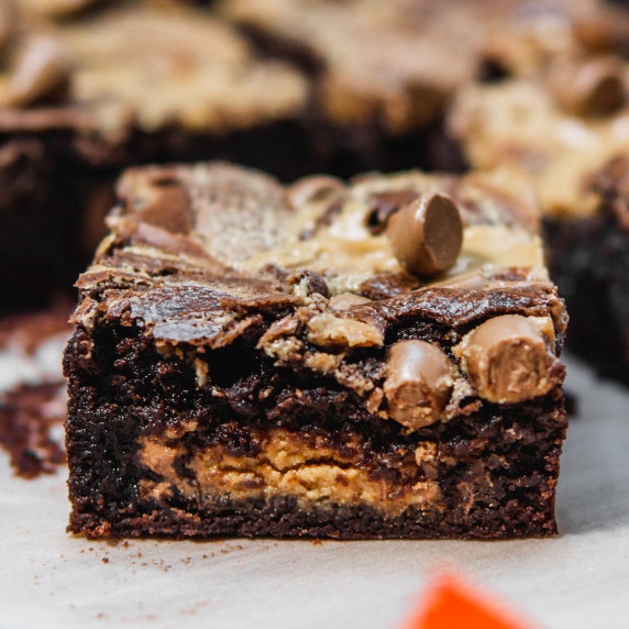 Side view of Swirled Peanut Butter Cup Brownies 