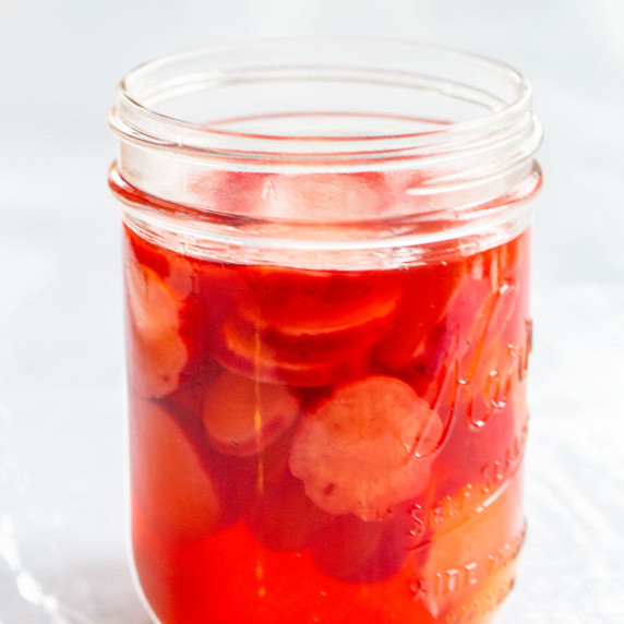 pickled radishes in a mason har